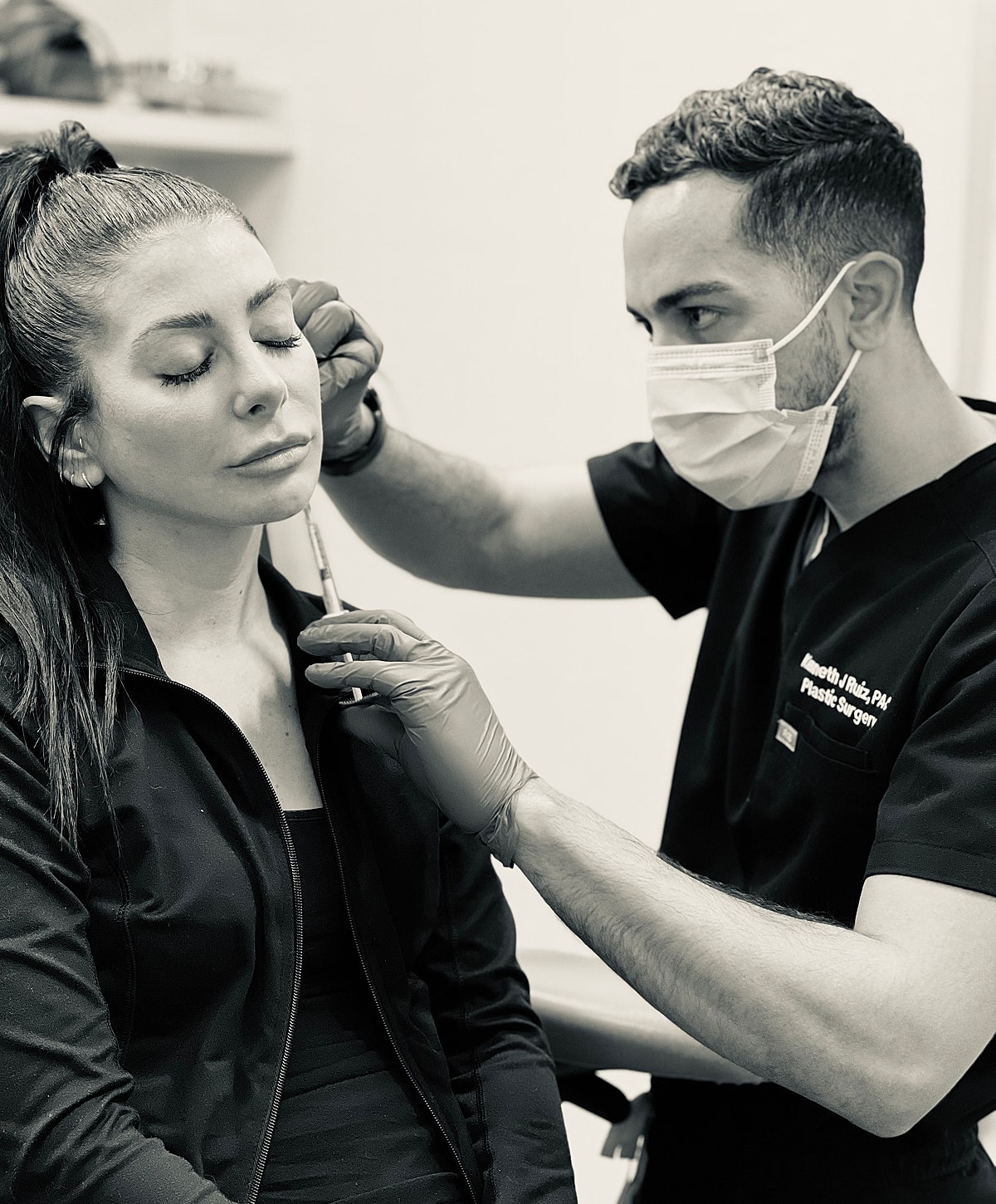 Patient receiving cosmetic treatment in clinical setting.
