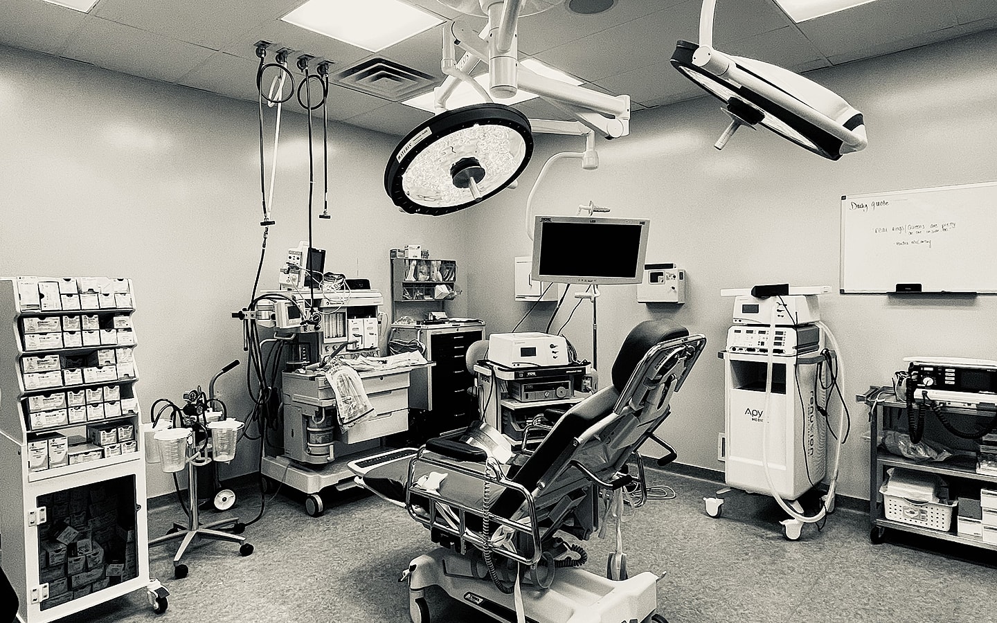 Modern surgical room with medical equipment.