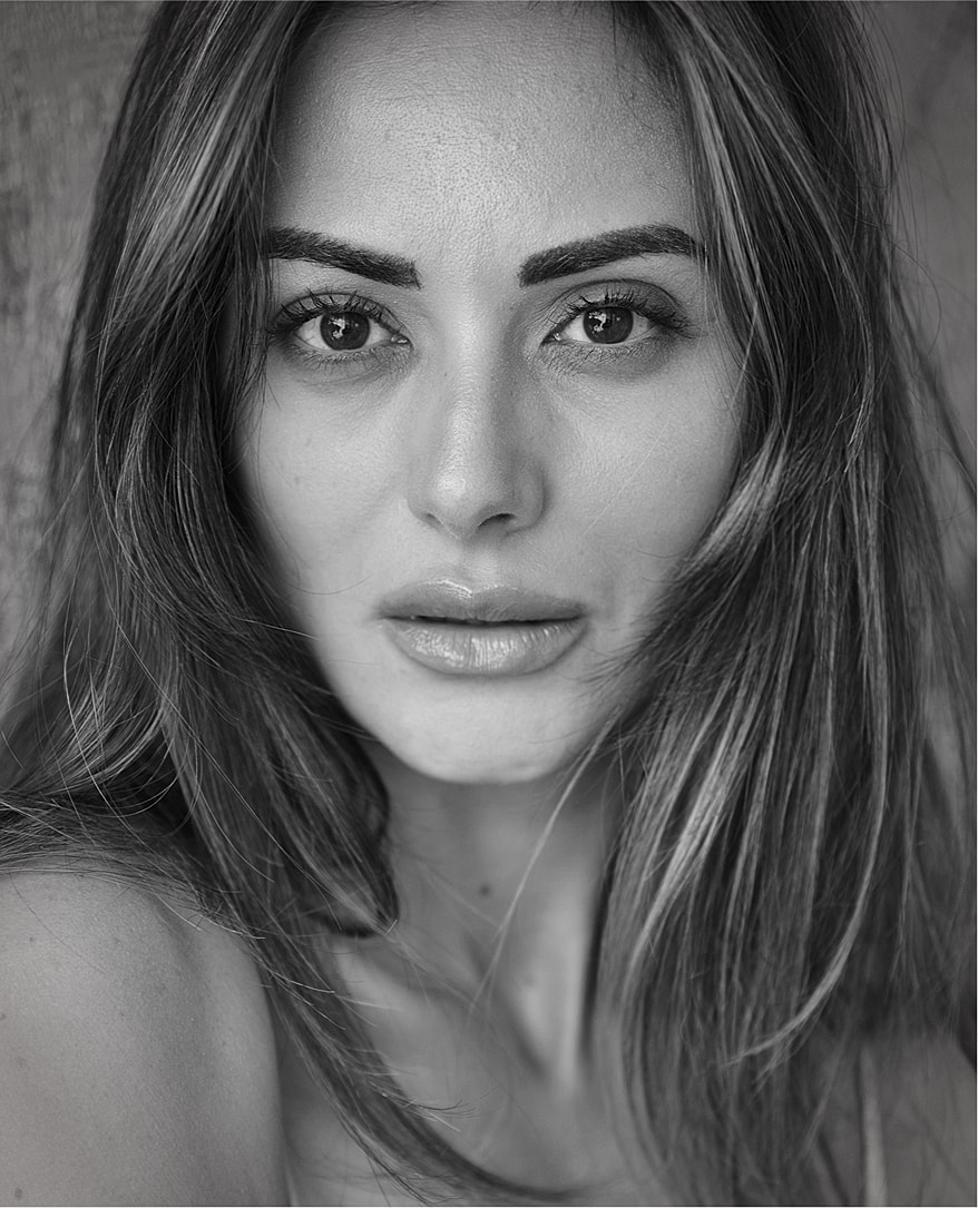 Black and white portrait of a woman.