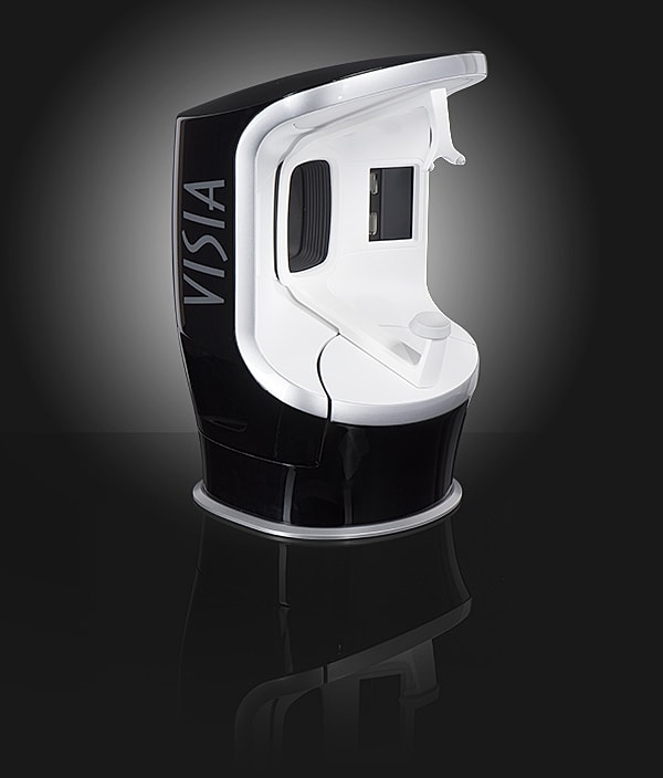 Skin analysis technology device on reflective surface.