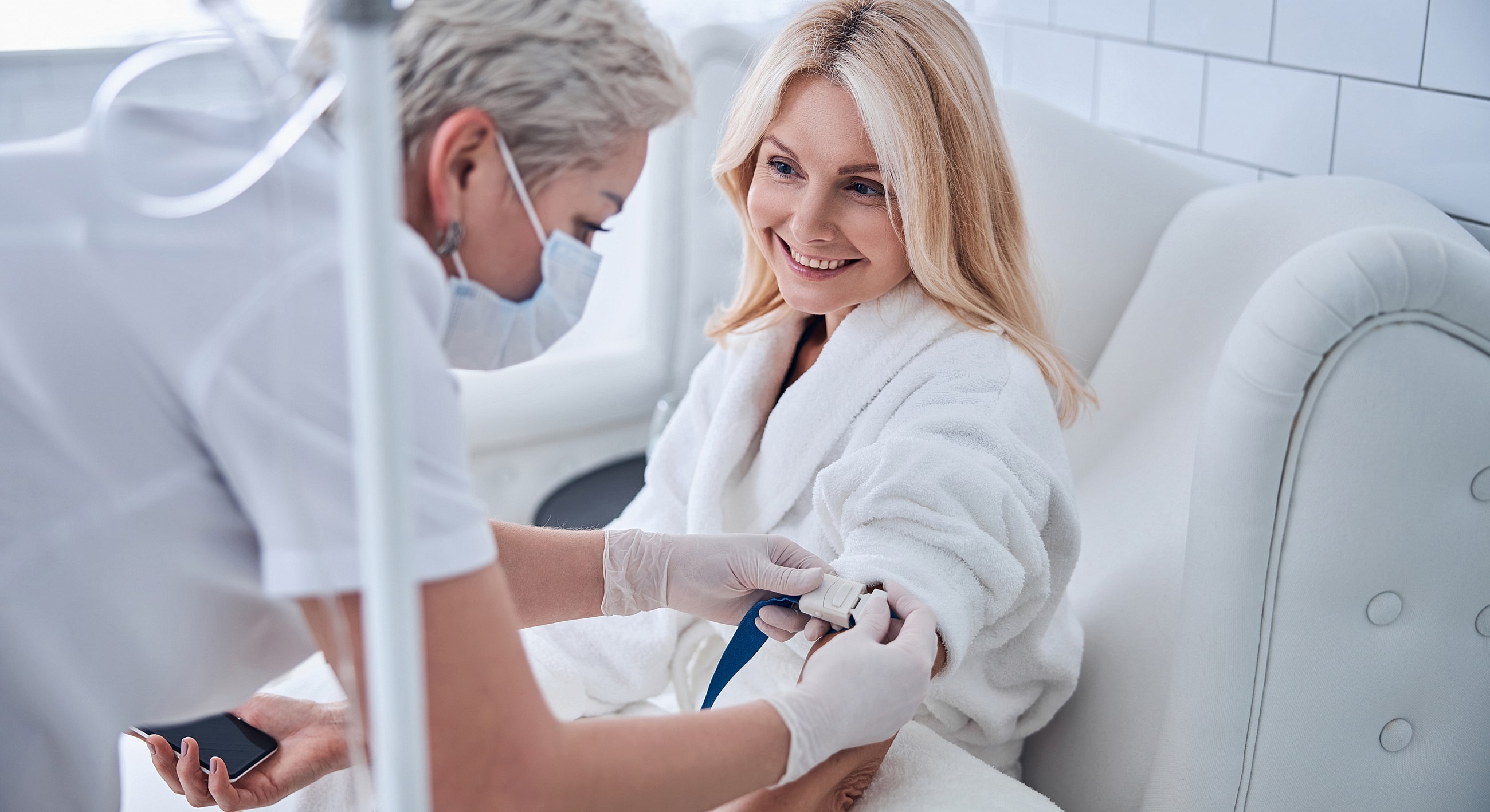Patient receiving treatment in a cozy setting.